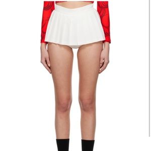 PUSHBUTTON WHITE PLEATED SKORT